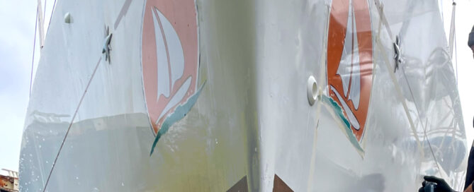 Boat hull comparison showing gelcoat yellowing on the left and SEALS-treated clean surface on the right
